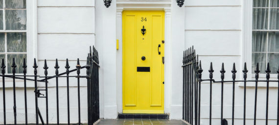 Front of home and yellow door
