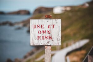 Ust at own risk sign