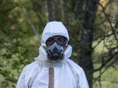 hazmat suit in the forest