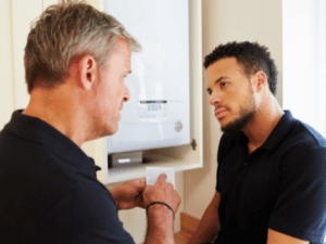 men near boiler